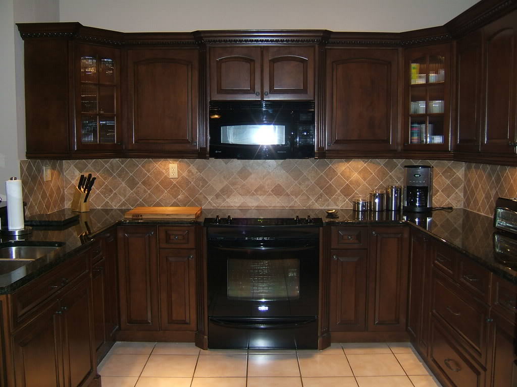 Image of: Black Cabinets In Kitchen Photos