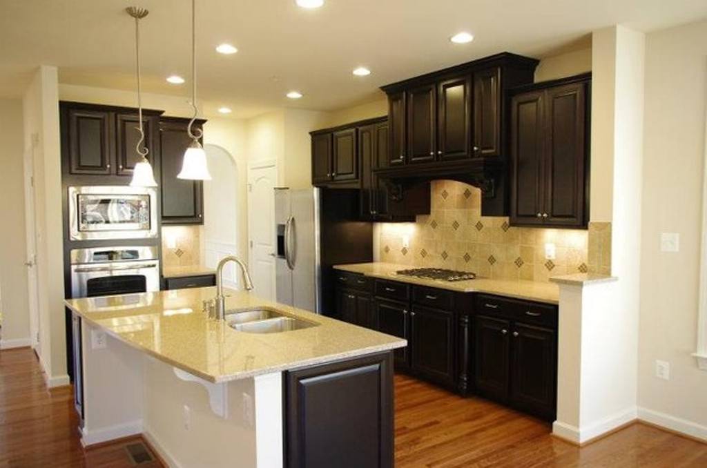 Image of: Kitchens With Black Cabinets And White Countertops