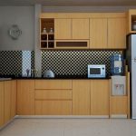 teak-kitchen-cabinets-dwell-flat-panel