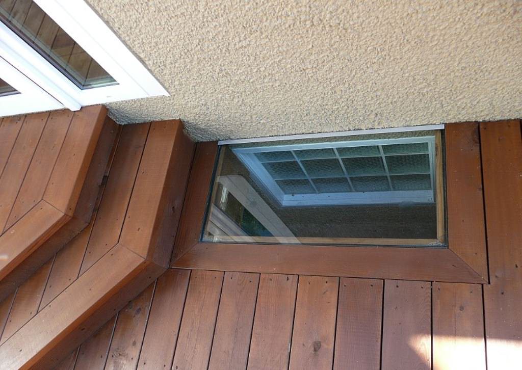 Image of: basement window wells idea over decks