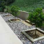 landscaping-with-river-rock-for-small-backyard