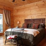 rustic bedroom with barn wood headboard