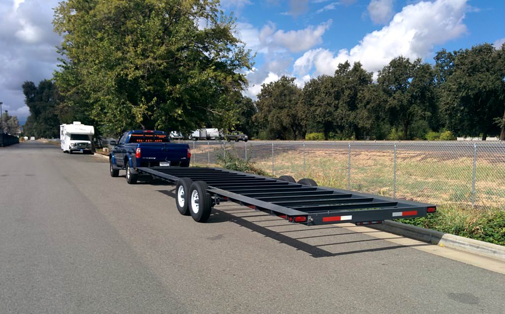 Image of: flatbed trailer for tiny house view on road
