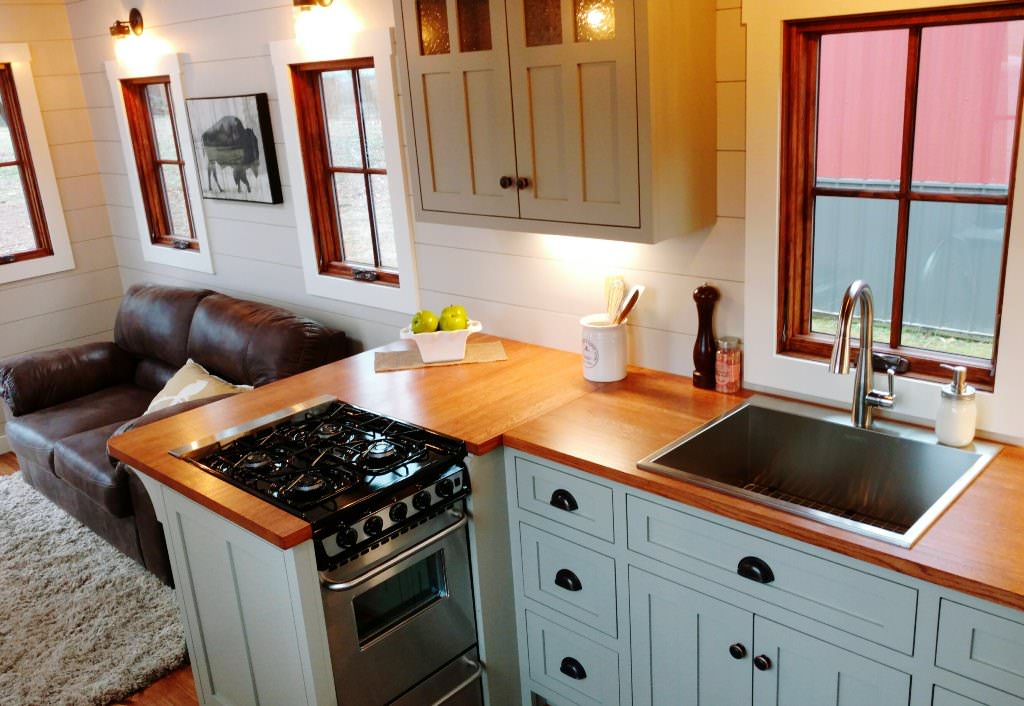 Image of: gooseneck tiny house kitchen view