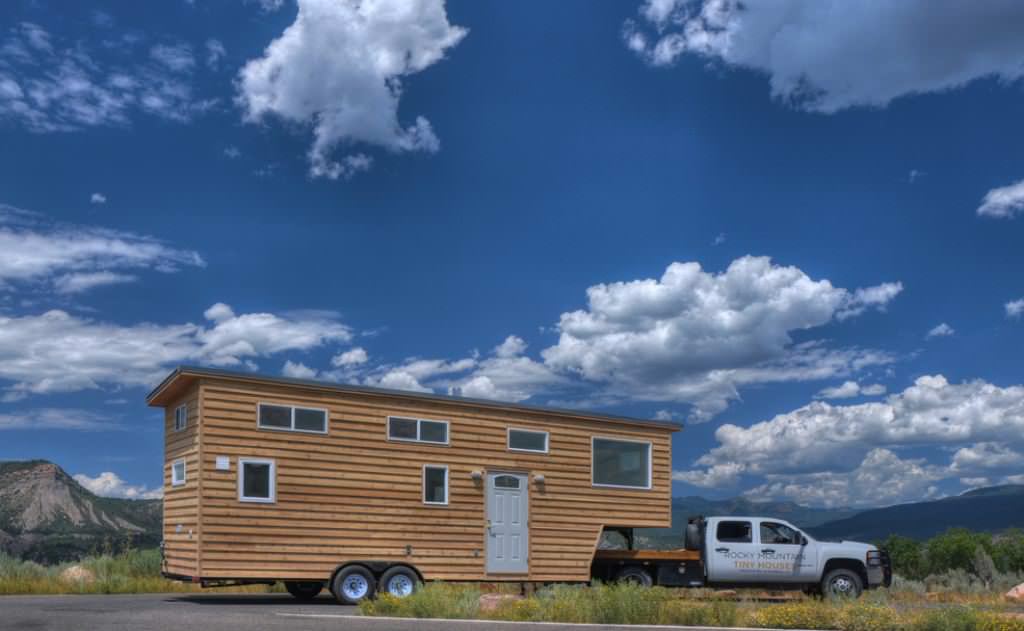 Image of: gooseneck tiny house on road side view
