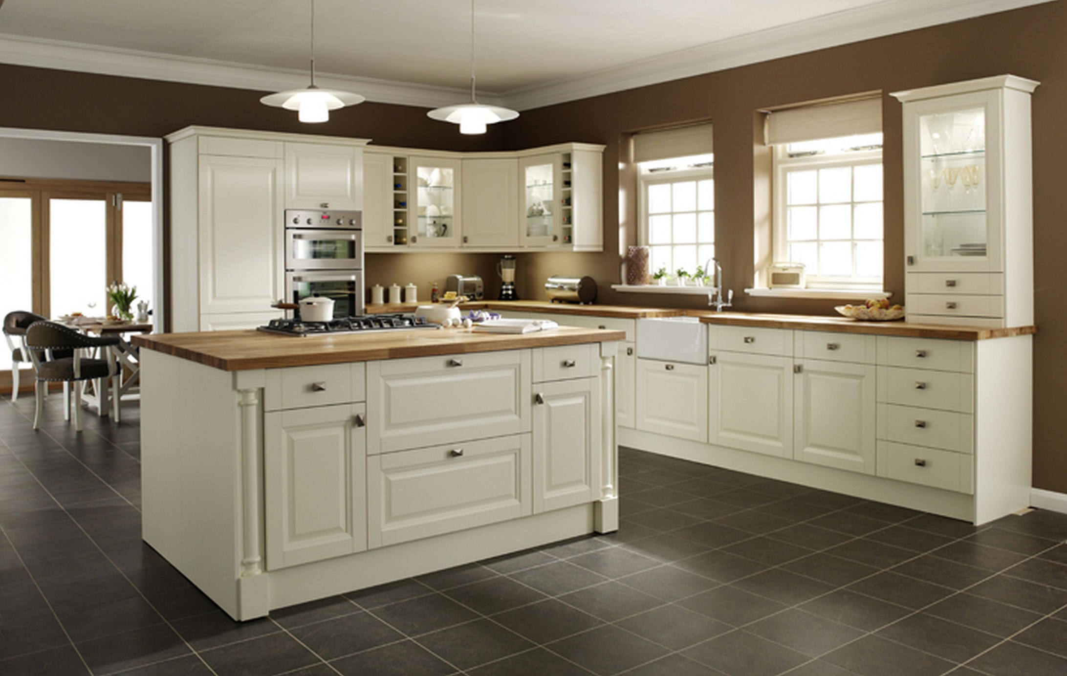 cream-kitchen-cabinets-with-granite-countertops
