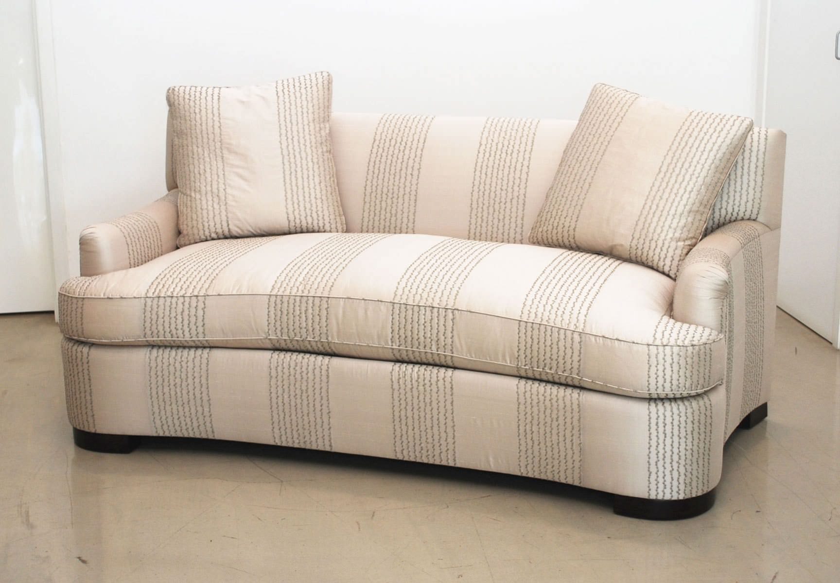 Image of: small curved loveseat